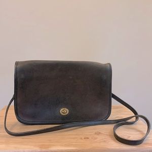 Vintage COACH cross-body leather purse.